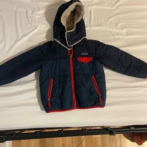 Patagonia Dark Blue Jacket with Bright Red Details